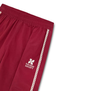 The New Society – TNS Jogginghose mit Spitzenlogo | Rot