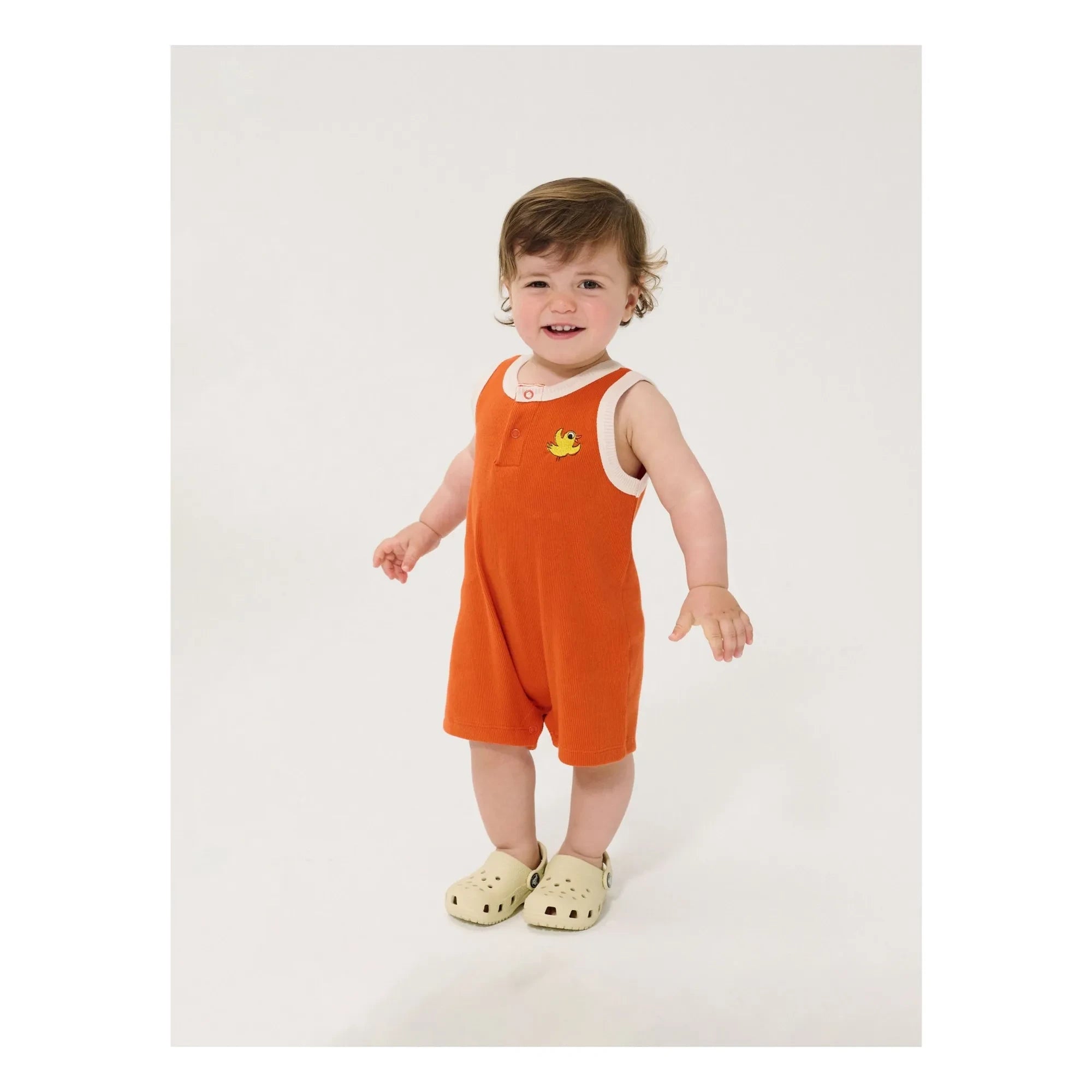 Bobo Choses - Bio-Baumwolle Vogel Rippstrampler | Orange
