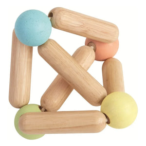 Plan Toys - Pastellfarbene Dreiecksrassel
