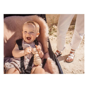 BINIBAMBA - Lammfell für Kinderwagen und Babyschale - 68x44 cm | Rosa