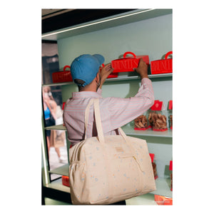 Nobodinoz - Wasserdichte Wickeltasche Opera Orange Cherries | Beige