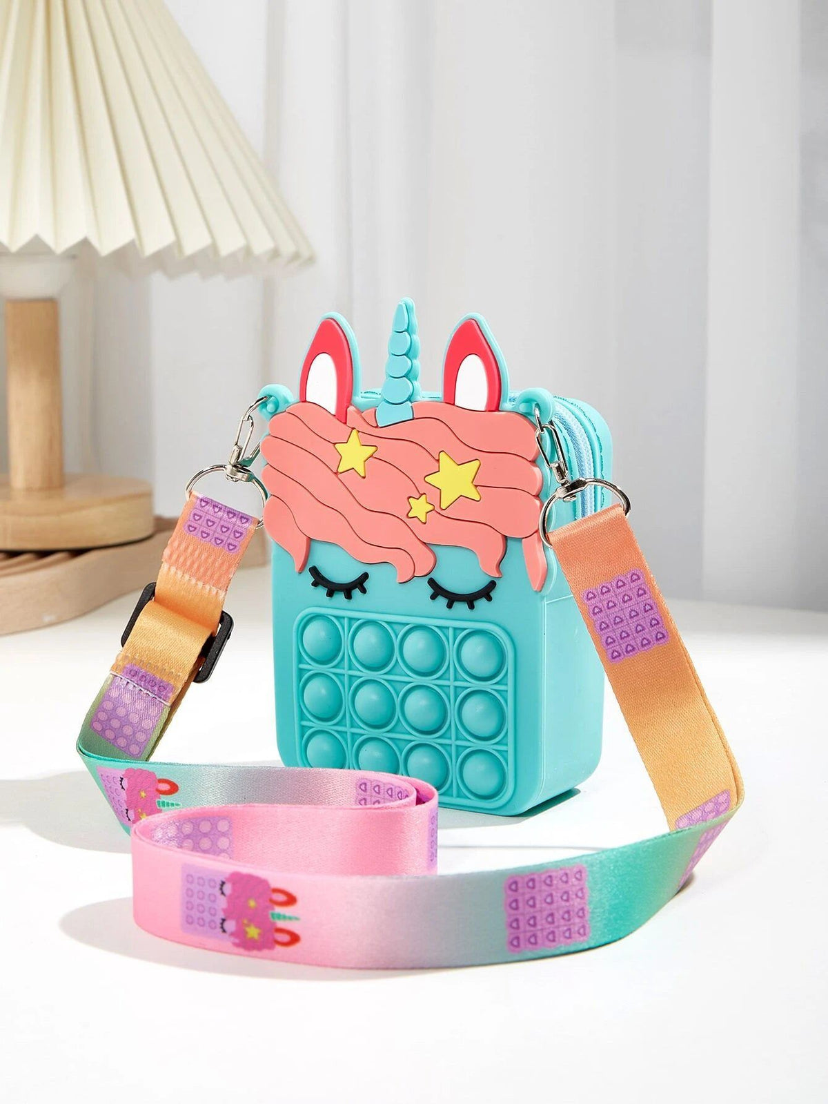 Dinossi – Babyblaue Mädchen-Umhängetasche mit Einhorn-Popit-Design
