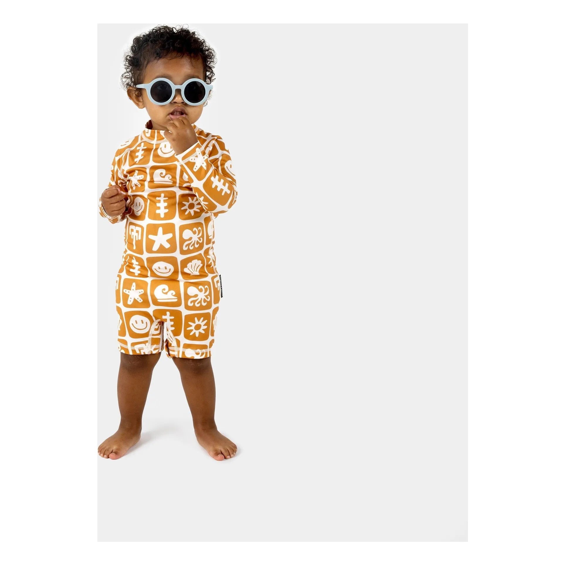 Beach & Bandits - Sea Smiley Recycelter Faser UV-Schutz-Overall | Ziegelrot