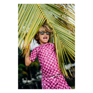 Beach & Bandits - Karierte Badehose aus recycelten Fasern mit UV-Schutz | Fuchsie