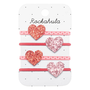 Rockahula Kids - Haarreif mit 4 glänzenden Herzen | Pink
