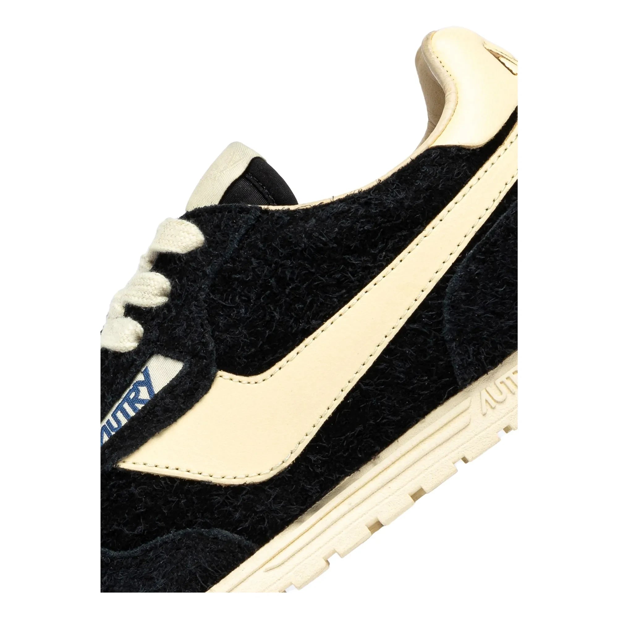 Autry – Windspin Low zweifarbige Sneaker aus Wildleder und Leder | Schwarz