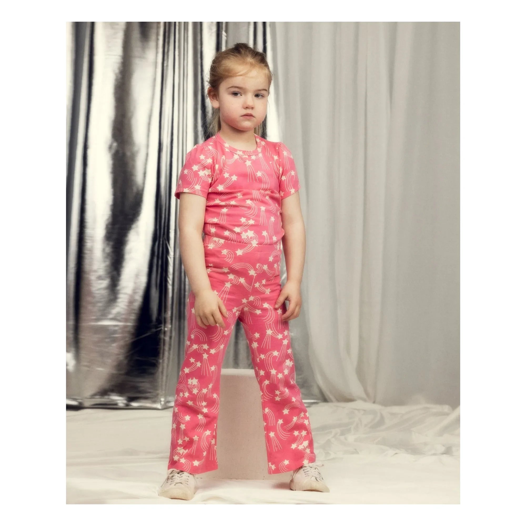 Mini Rodini – Schlaghose aus Bio-Baumwolle mit Sternenmuster | Pink
