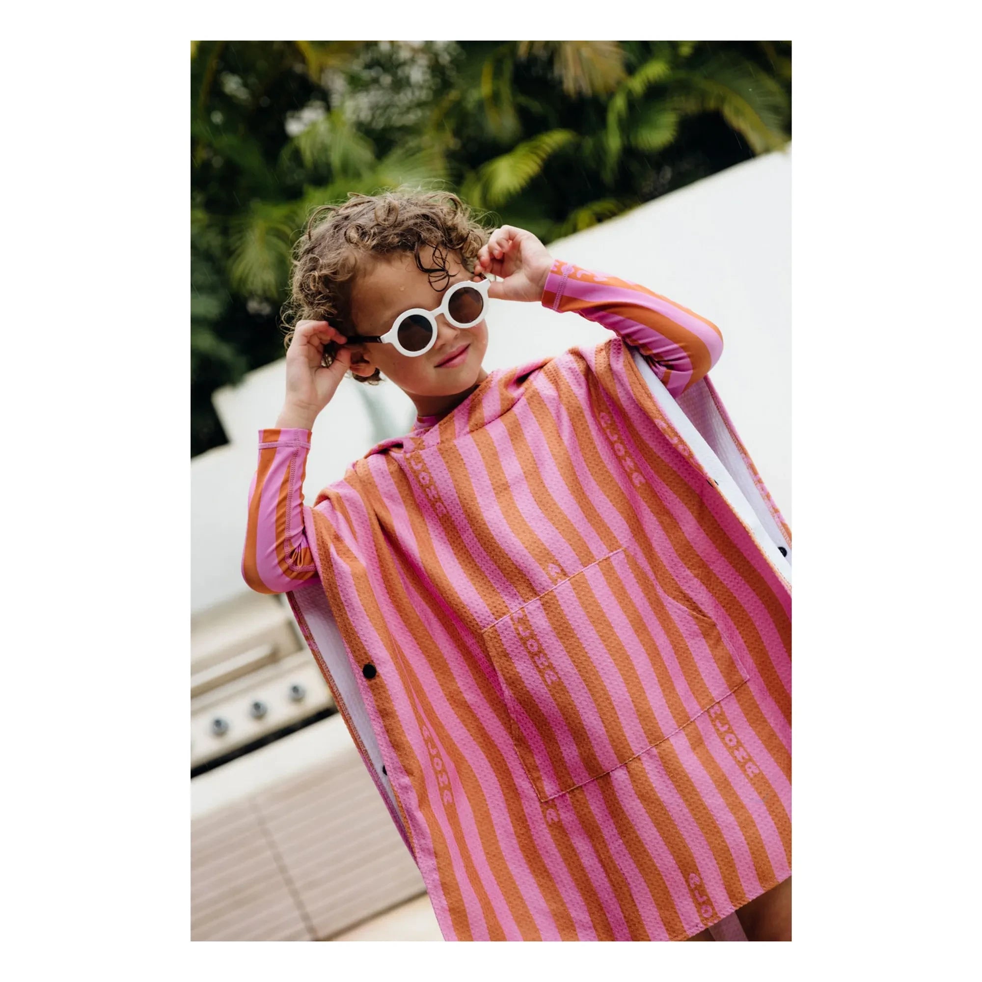 Beach & Bandits - Aloha Gestreifter Poncho aus Bio-Baumwolle | Rosa