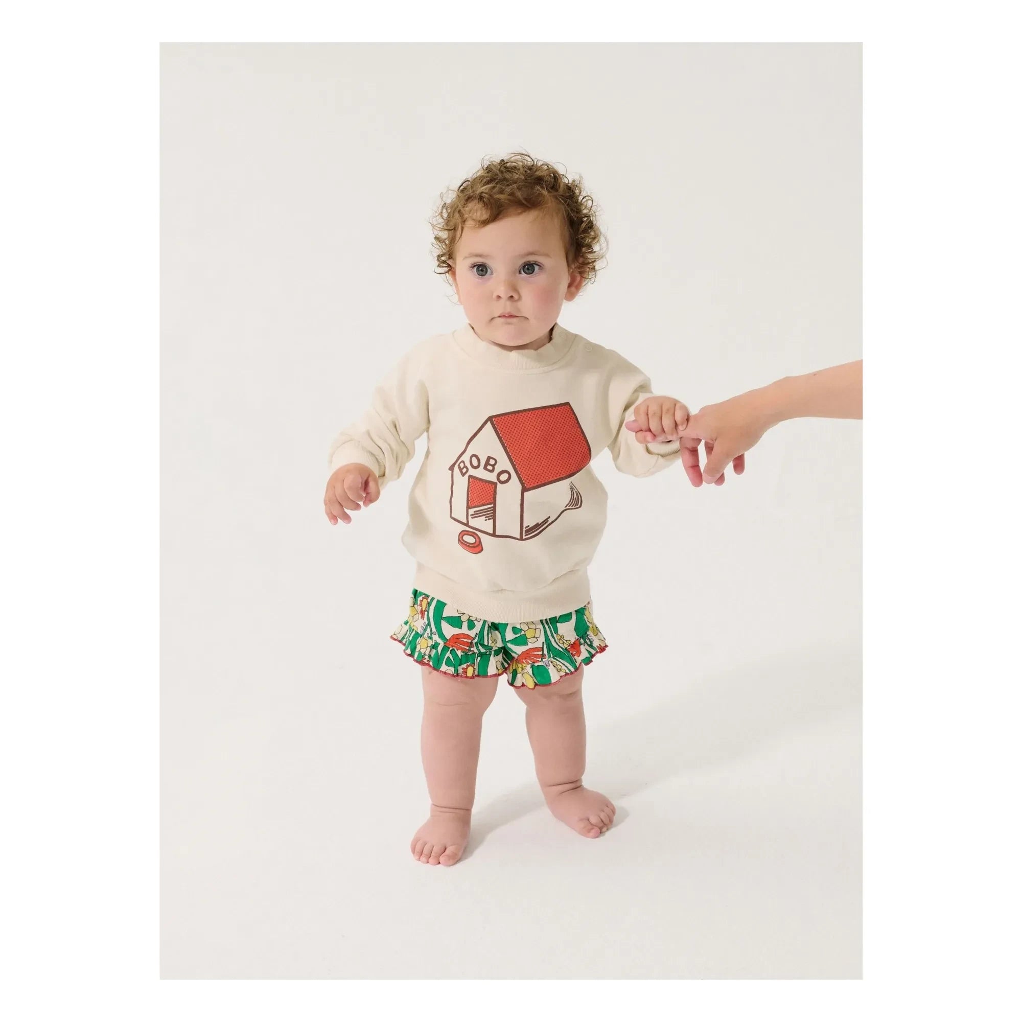 Bobo Choses - Bio-Baumwoll-Babyshorts mit Blumenmuster und Rüschen | Ecru
