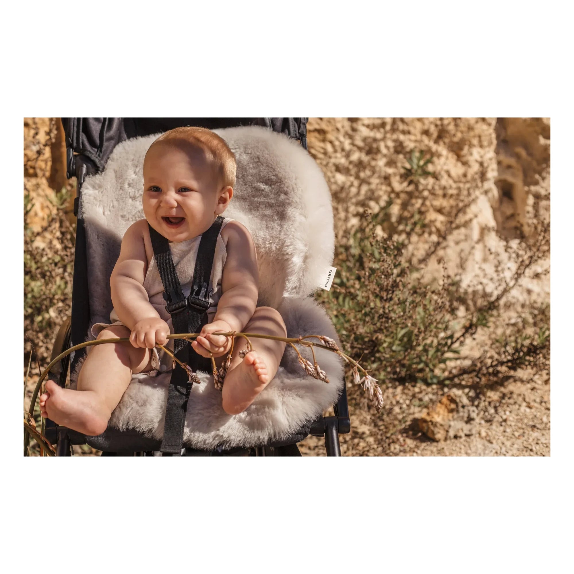 BINIBAMBA - Lammfell für Kinderwagen und Babyschale mit Pelzfutter - 68x44 cm | Moon