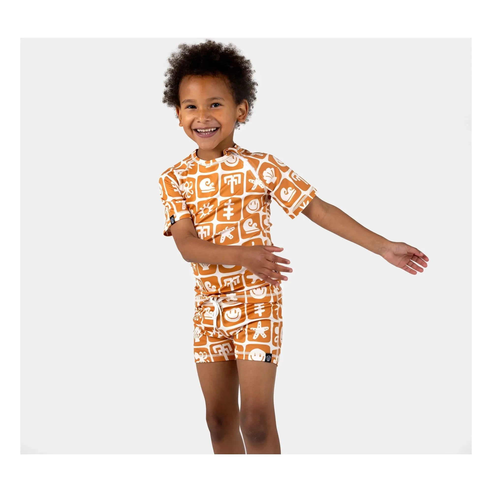 Beach & Bandits - Sea Smiley UV-Schutz Badeshorts aus recycelten Fasern | Rostfarben