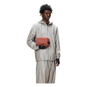 Rains - Kleine W3 Reisetasche | Ziegelrot
