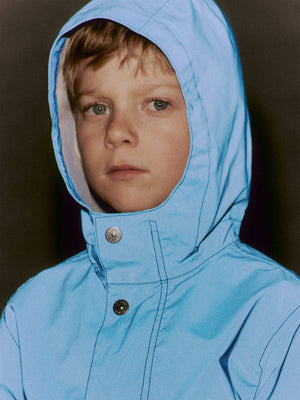 Stone Island Boys Plated Reflective Wind Resistant Hooded Jacket in Blue