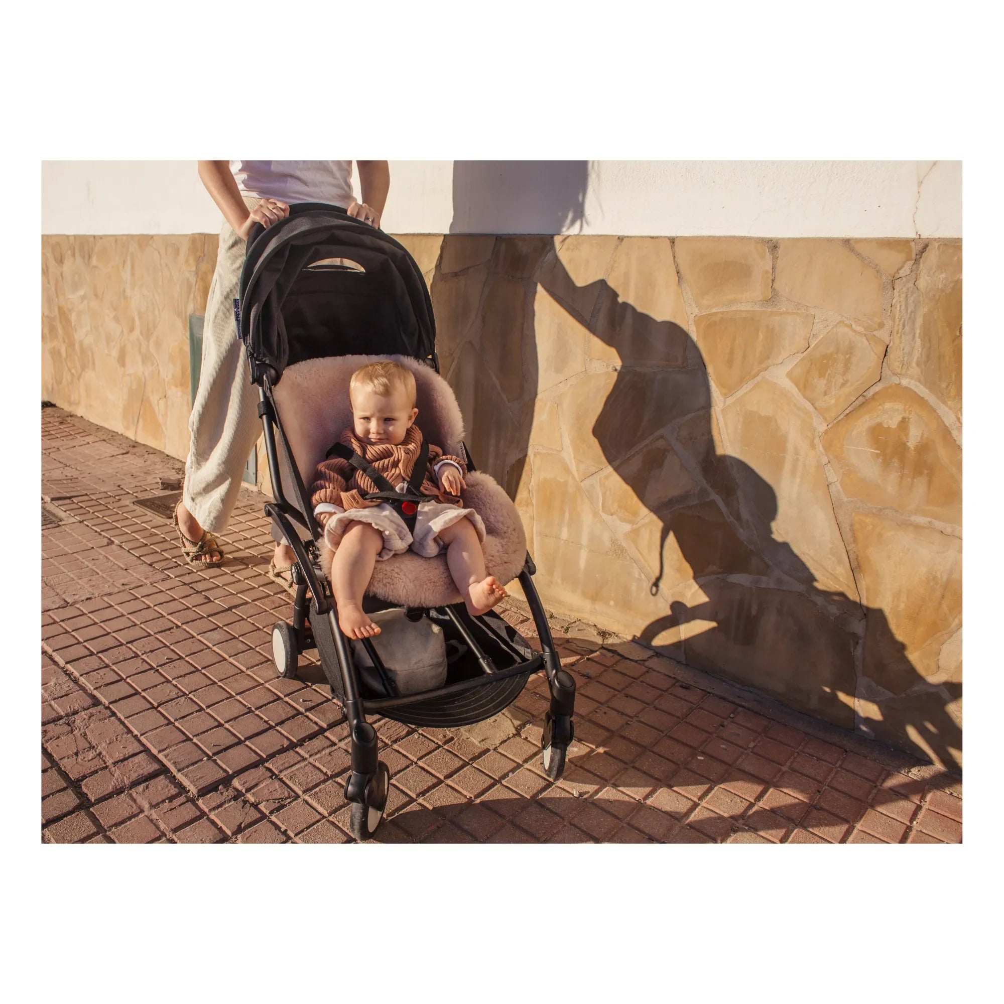 BINIBAMBA - Lammfell für Kinderwagen und Babyschale - 68x44 cm | Rosa