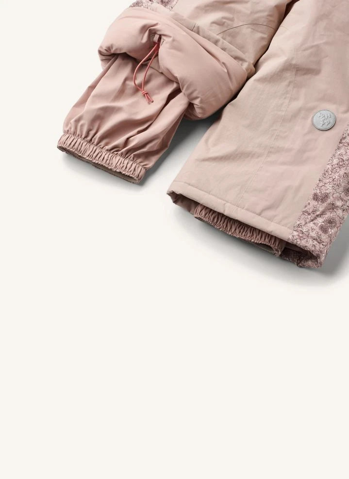 Wheat - Melte Fleurs Skioverall aus recycelten Fasern | Hellrosa