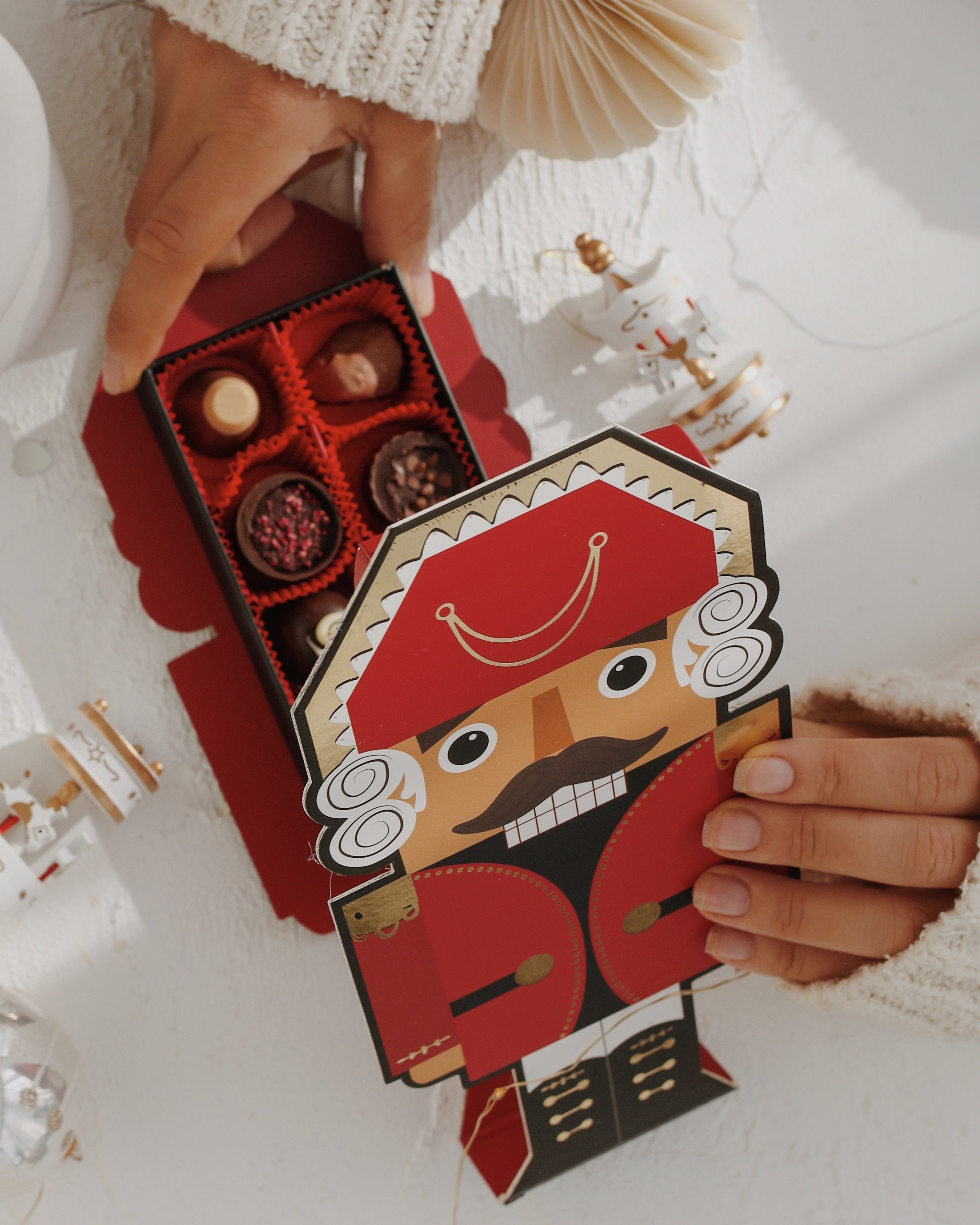 Dinossi - Weihnachts-Nussknacker-Box Belgische Weihnachtsschokolade