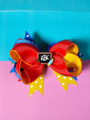 Dinossi – Haarspange für Mädchen im Schul-ABC-Design 