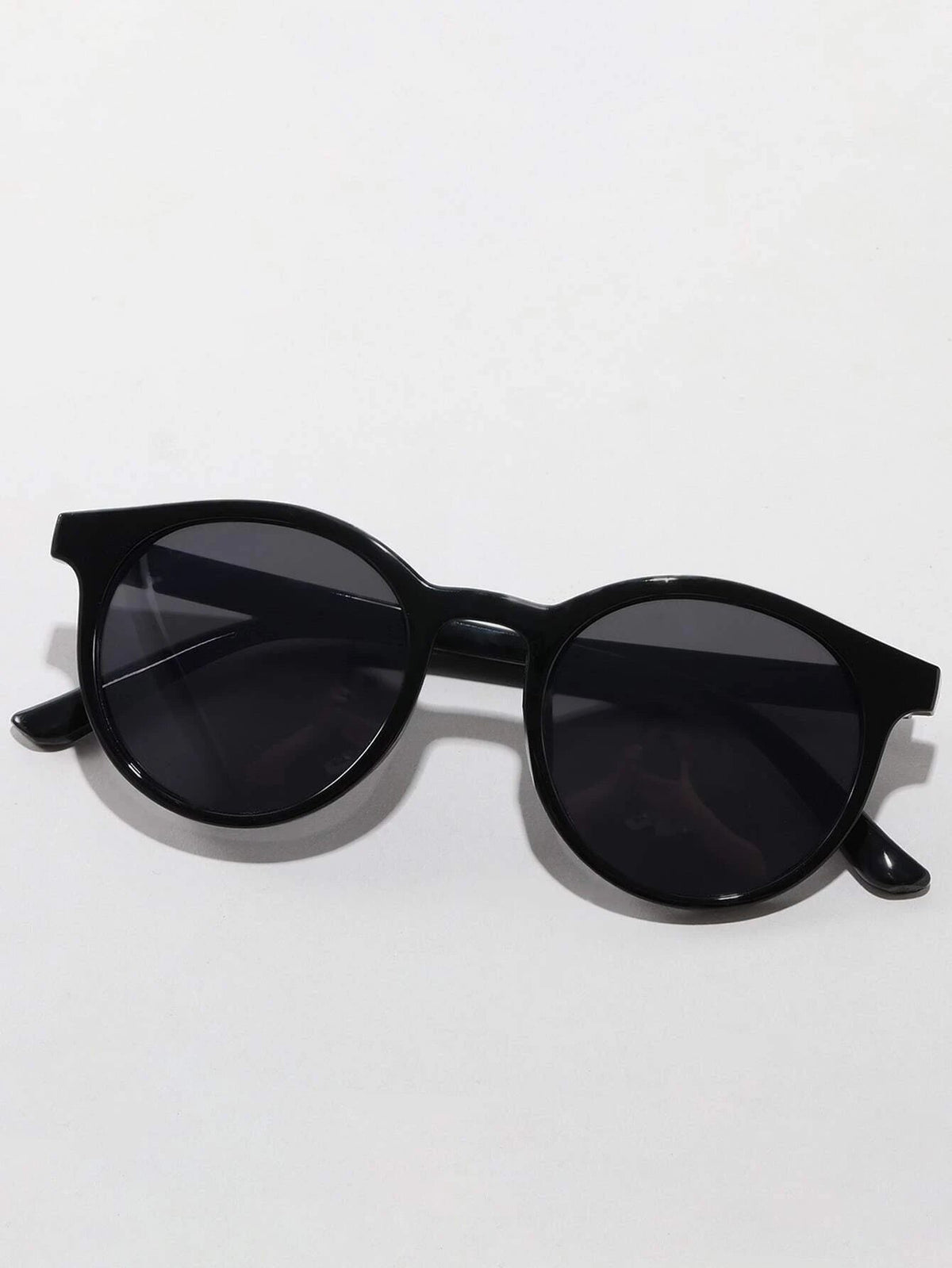 Dinossi – Schwarze, leichte, runde Kindersonnenbrille 