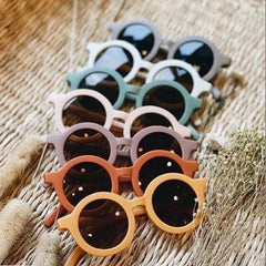 Dinossi – Nachhaltige Kindersonnenbrille, rundes Modell – Braun 