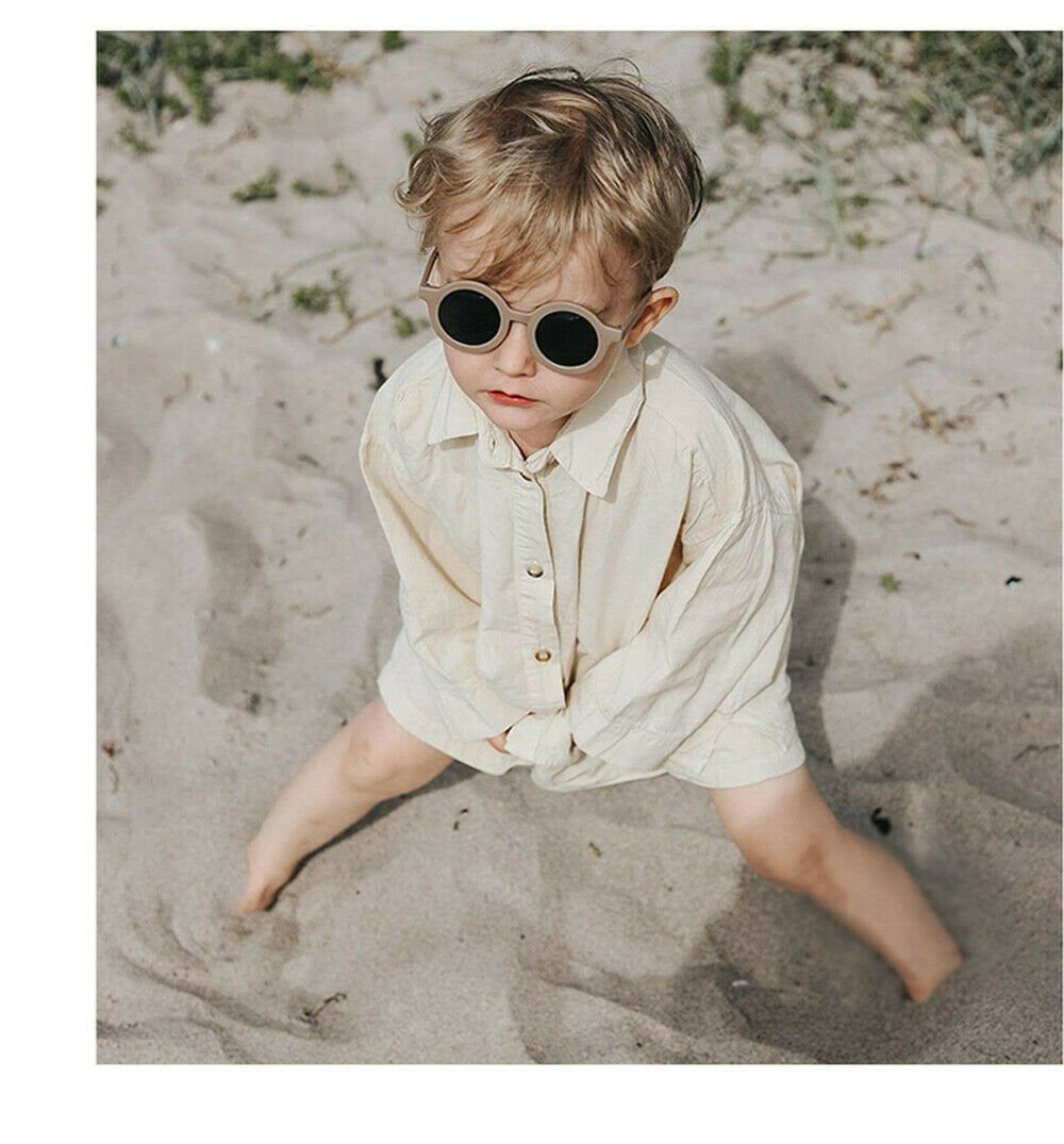 Dinossi – Nachhaltige Kindersonnenbrille, rundes Modell – Braun 