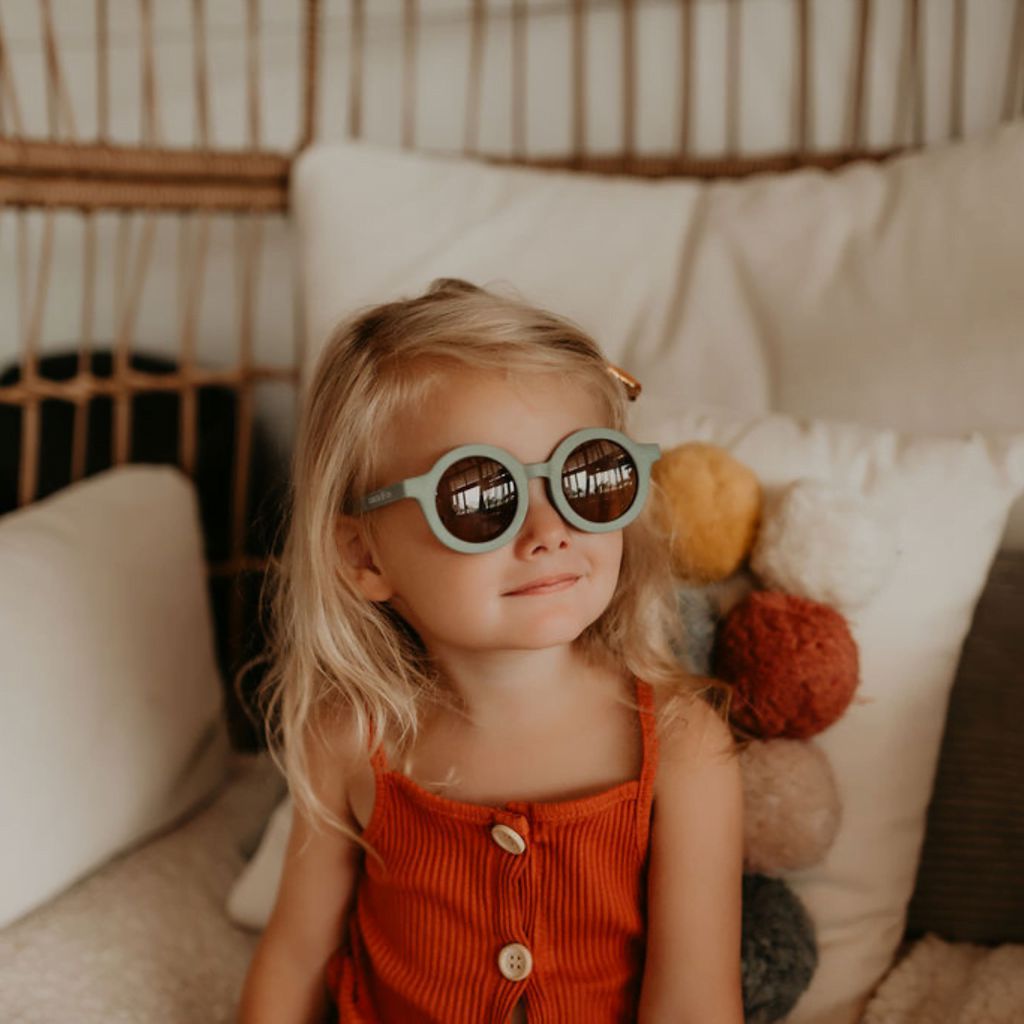 Dinossi – Nachhaltige braune runde Kindersonnenbrille 
