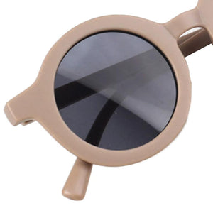 Dinossi – Nachhaltige braune runde Kindersonnenbrille 