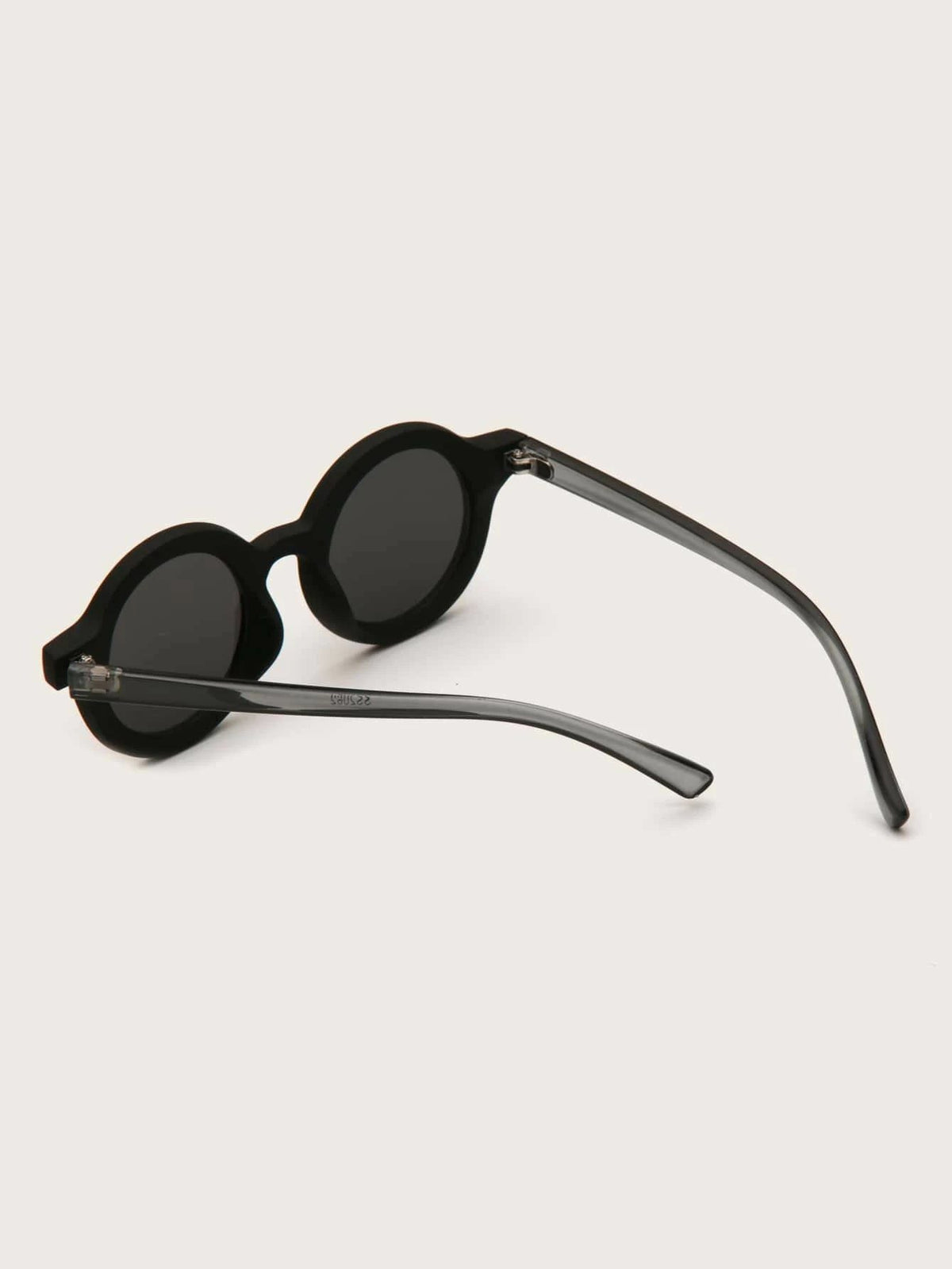 Dinossi – Nachhaltige schwarze runde Kindersonnenbrille 