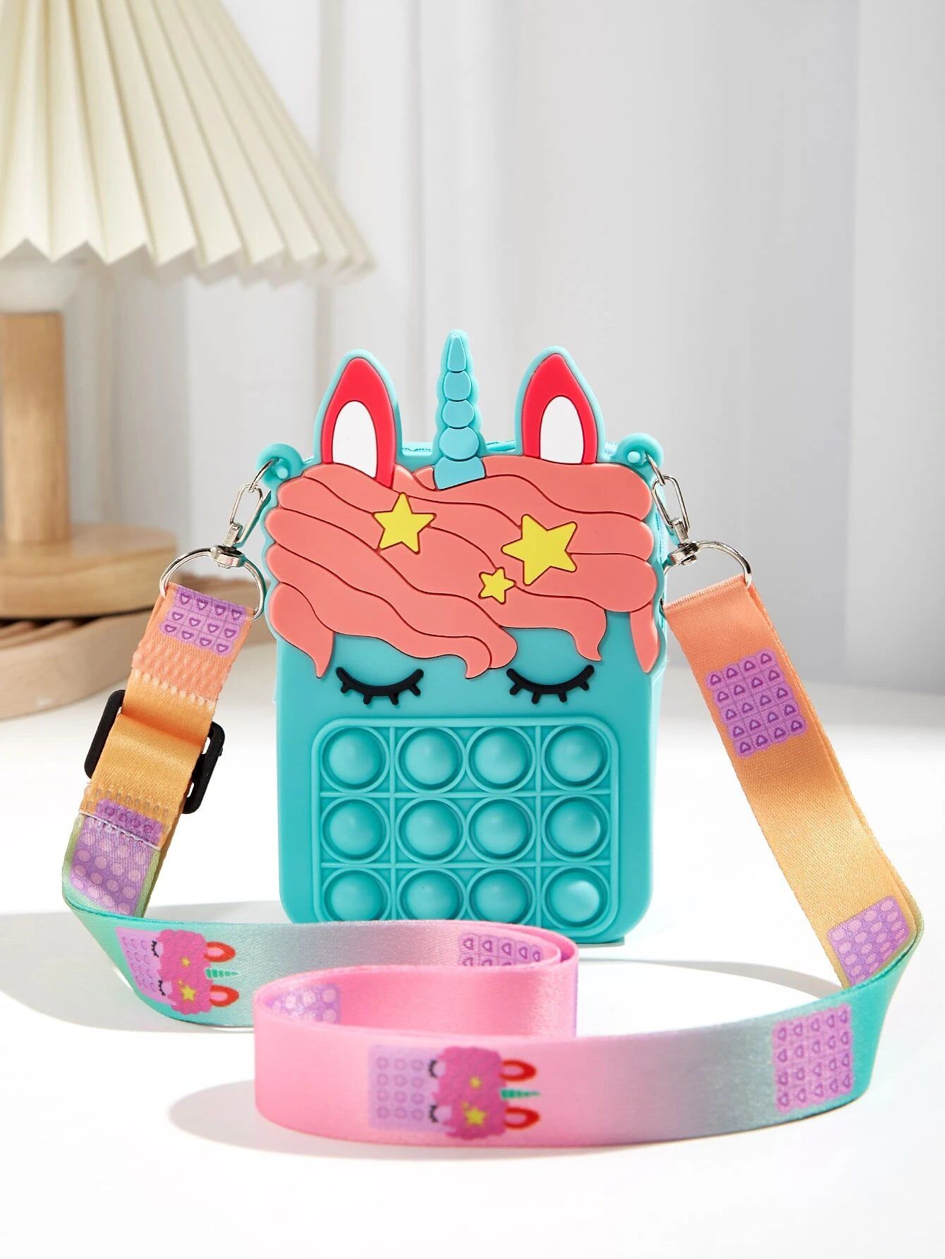 Dinossi – Babyblaue Mädchen-Umhängetasche mit Einhorn-Popit-Design 