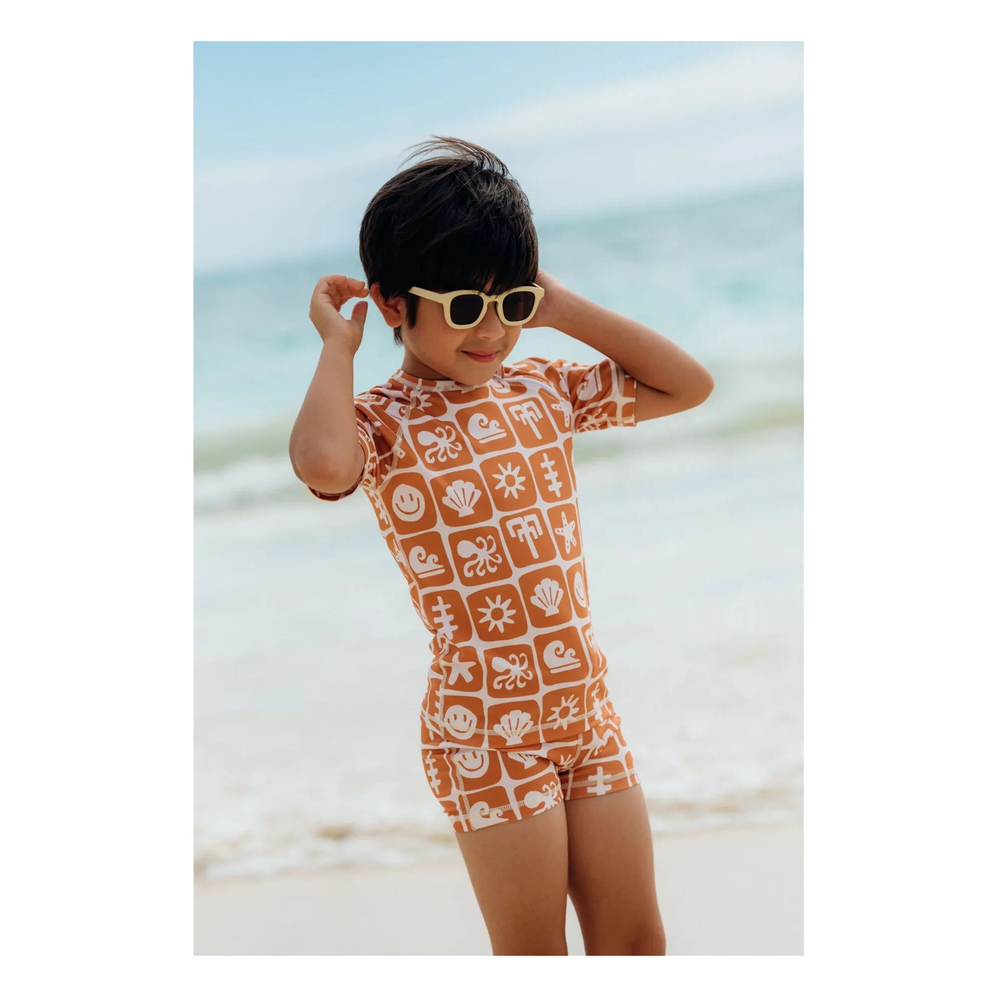 Beach & Bandits - Sea Smiley UV-Schutz Badeshorts aus recycelten Fasern | Rostfarben